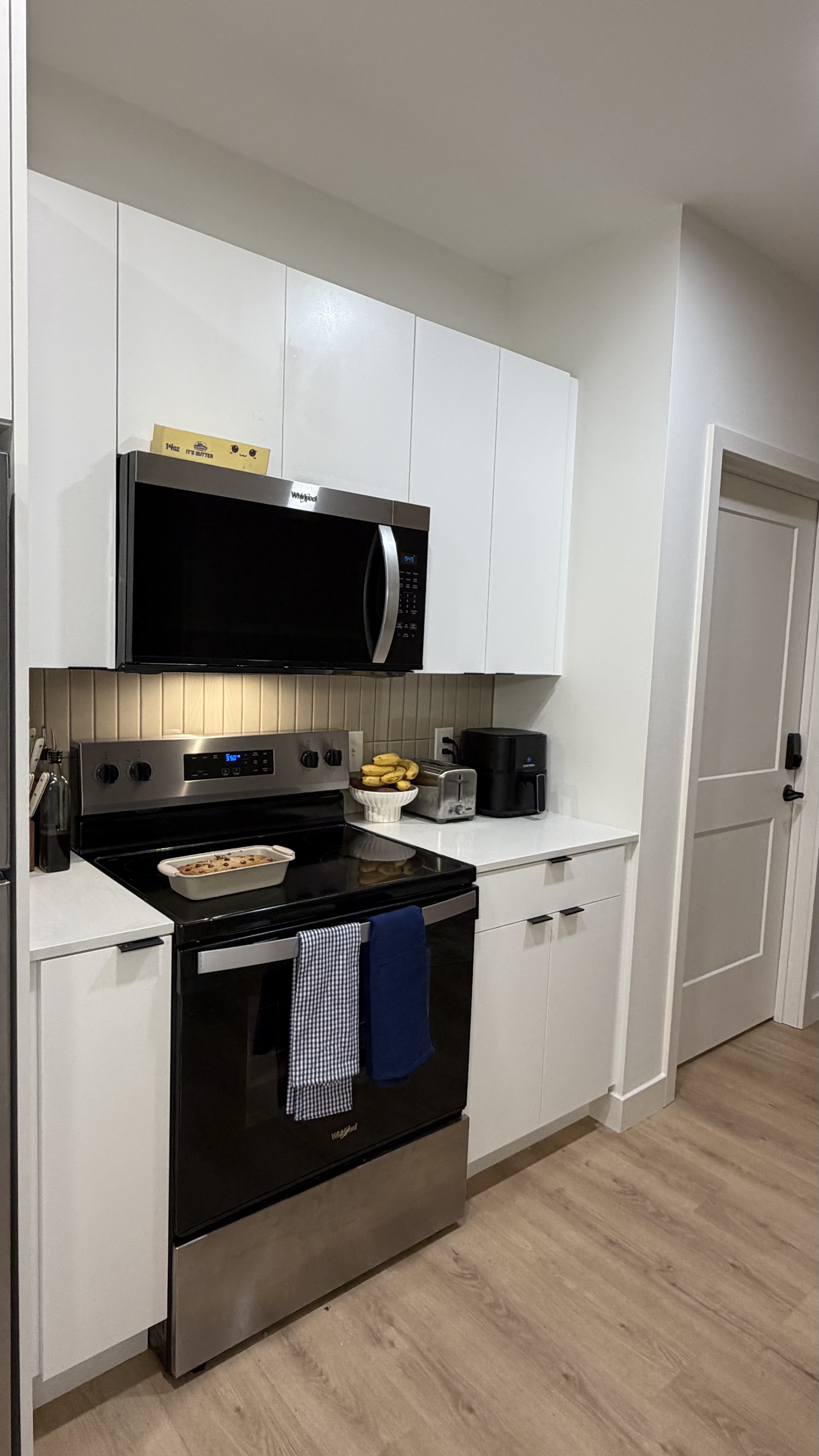 Microwave, oven, cabinets